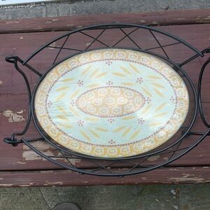 Temptations oval casserole carrier with glass hot plate inside.